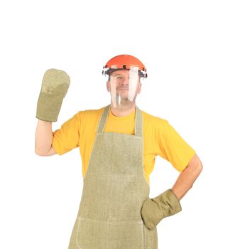 Welder with protective face shield and apron.  Isolated on a white background.