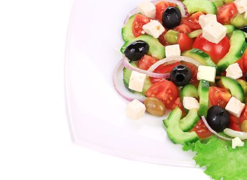 Fresh greek salad. Isolated on a white background.