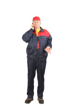 Worker talking on the cell phone. Isolated on a white background.