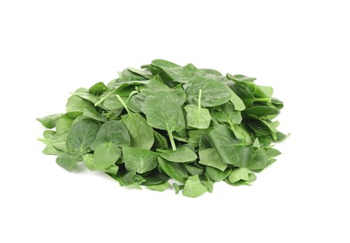 Heap of fresh spinach. Isolated on a white background.