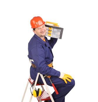 Worker on ladder holding toolbox. Isolated on a white background.