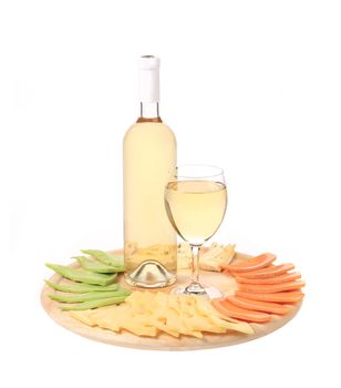 Bottle of chardonnay and cheese platter. Isolated on a white background.