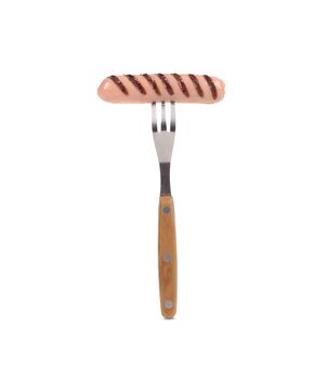 Grilled sausage on a fork. Isolated on a white background.