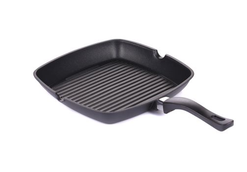 Black frying pan. Isolated on a white background.