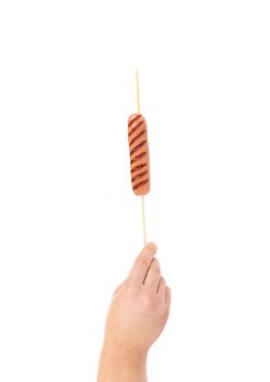 Grilled sausage on skewer. Isolated on a white background.