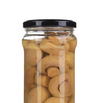 Glass jar with marinated mushrooms. Isolated on a white background.