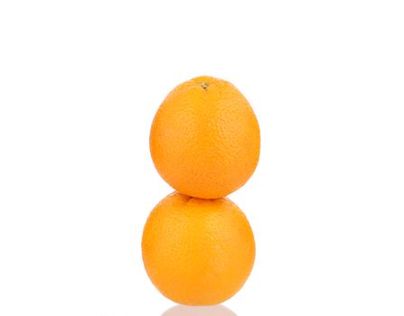 Two ripe oranges. Isolated on a white background.