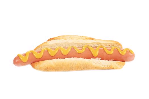 Big tasty hot dog with mustard. Isolated on a white background.