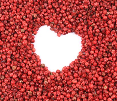 Red peppercorn in shape of heart.