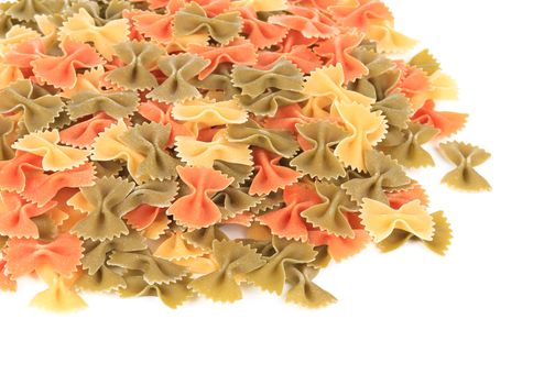 Uncooked italian pasta farfalle. Isolated on a white background.