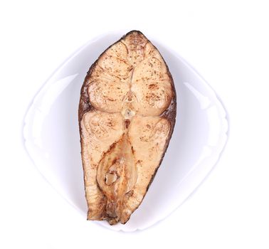 Fried carp fish steak. Isolated on a white background.