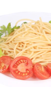 Delicious spaghetti with herbs. Isolated on a white background.