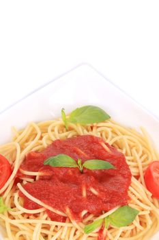 Tasty italian pasta with tomato sauce. Isolated on a white background.
