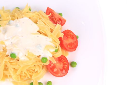 Tasty italian pasta with white sauce. Isolated on a white background.