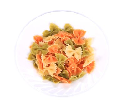 Delicious italian pasta farfalle. Isolated on a white background.