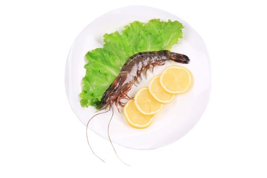 Raw shrimp with lemon. Isolated on a white background.