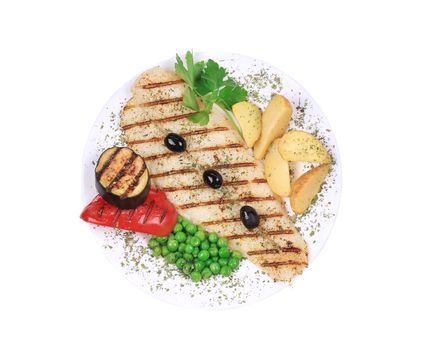 Grilled fish fillet with tasty vegetables. Isolated on a white background.