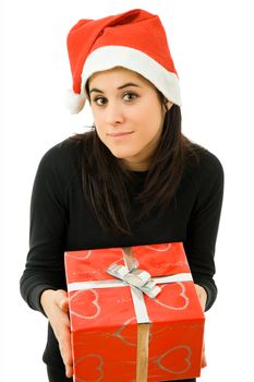 beautiful young girl holding a christmas gift, isolated