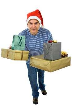 young man with santa hat holding a few gifts, isolated