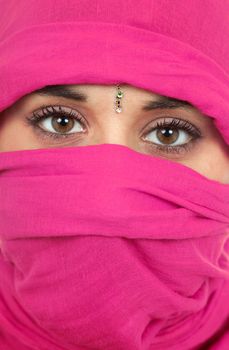 young woman with a veil, close up portrait, studio picture