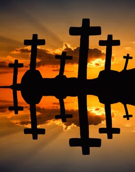 cross at the sunset and the orange clouds