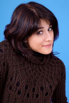 young beautiful woman, on a blue background