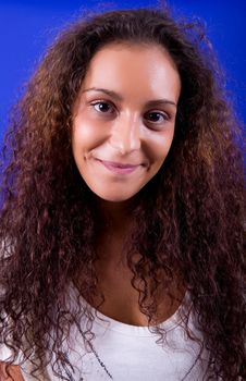 young beautiful woman, on a blue background