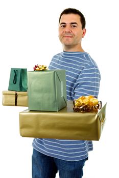 young casual man holding a few gifts, isolated