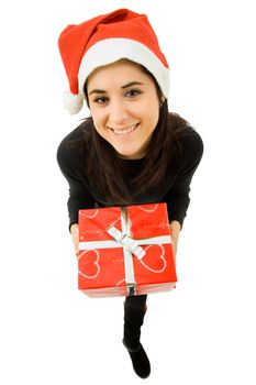 beautiful young girl holding a christmas gift, isolated