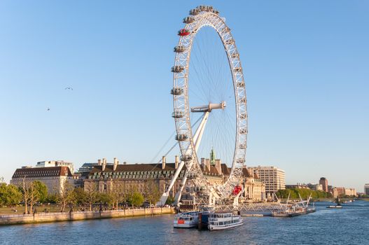 LONDON, UNITED KINGDOM - MAY 10: London Eye in afternoon sun on May 10, 2011 in London. The giant Ferris wheel is 135 meters tall and the wheel has a diameter of 120 meters.