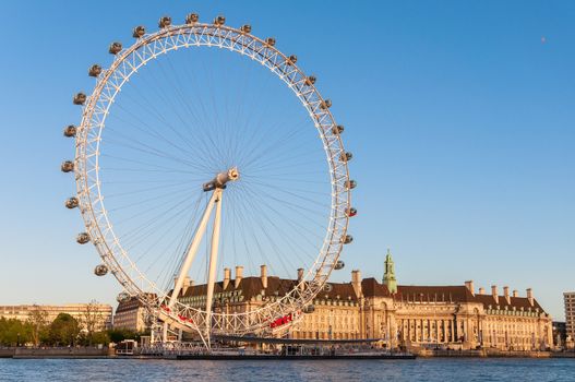 LONDON, UNITED KINGDOM - MAY 10: London Eye in afternoon sun on May 10, 2011 in London. The giant Ferris wheel is 135 meters tall and the wheel has a diameter of 120 meters.