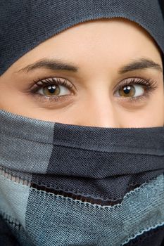 young woman with a veil, close up portrait, studio picture