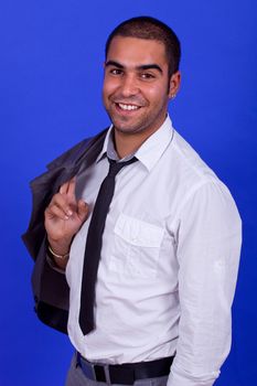 young happy businessman, on a blue background