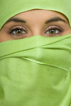 young woman with a veil, close up portrait, studio picture