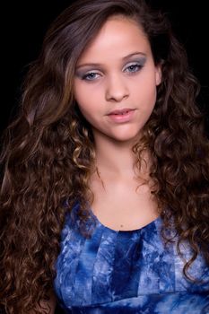 young beautiful woman, on a black background