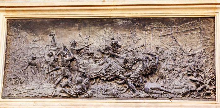 King Ferdinand Battle with Moors 1492 Isabella Colombus Statue Andalusia Granada Spain.  Statue made in 1892 in Rome.  This bronze shows Battle of Granada in 1492