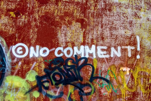 No comment - graffiti inscription on the dirty wall