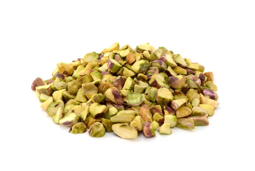 Chopped pistachio nuts, isolated on a white background