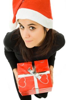 beautiful young girl holding a christmas gift, isolated