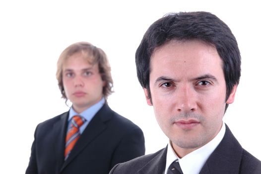 two young business men portrait on white. focus on the right man