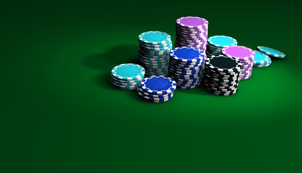 Gambling casino chips stacked on green table. Great background for poker magazines, banners, webpages, flyers, etc.