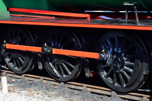 Three steam train wheels