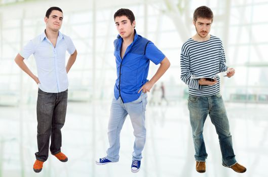 three young casual men standing