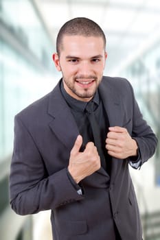 young business man portrait at the office