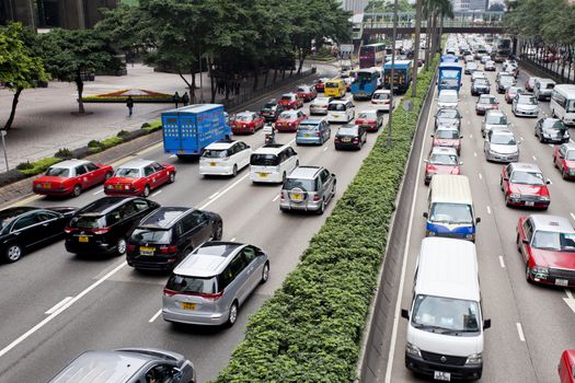 HONG KONG - FEB 9, Traffic jam at Wan Chai, Hong Kong on 9 February, 2014. It is one of the busiest district in Hong Kong. Hong Kong's above-ground transport is running into major challenges.