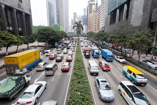 HONG KONG - FEB 9, Traffic jam at Wan Chai, Hong Kong on 9 February, 2014. It is one of the busiest district in Hong Kong. Hong Kong's above-ground transport is running into major challenges.