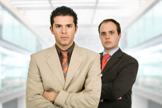 two young business men portrait at the office