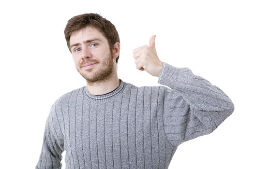 young casual man going thumb up, isolated on white