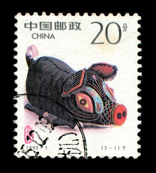 CHINA - CIRCA 1995: A postage stamp printed in China shows 1995 Lunar Year of the Boar.The Boar is one of the 12-year cycle of animals which appear in the Chinese zodiac,circa 1995.