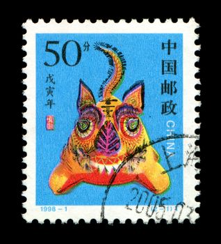 CHINA - CIRCA 1998: A postage stamp printed in China shows 1998 Lunar Year of the Tiger.The Tiger is one of the 12-year cycle of animals which appear in the Chinese zodiac,circa 1998.
